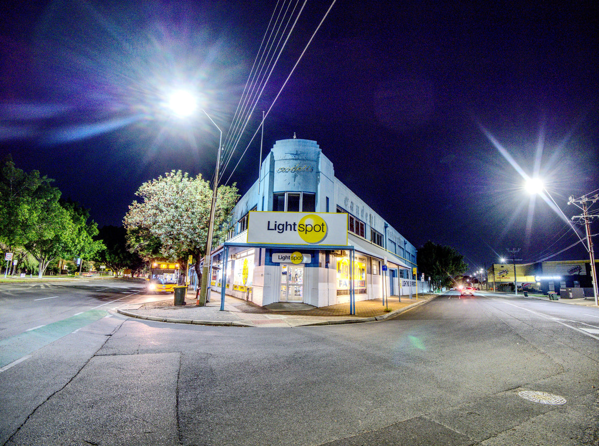 Lightspot showroom exterior on Anzac Highway in Keswick, photographed at night